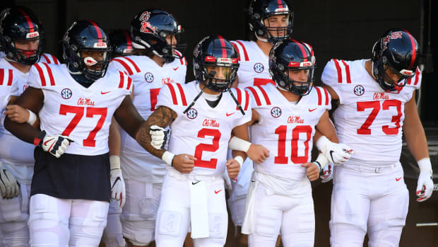 Mississippi Rebels quarterback Matt Corral (2) leads the team onto the field before a game against the Vanderbilt Commodores at Vanderbilt Stadium. Mandatory Credit: Christopher Hanewinckel-USA TODAY Sports